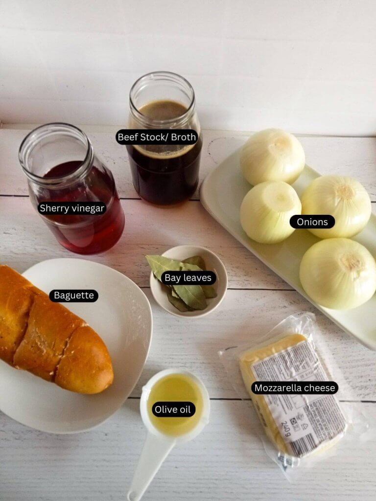 A photo of all ingredients needed for the Be our guest French onion soup with tags of labels on each item. 