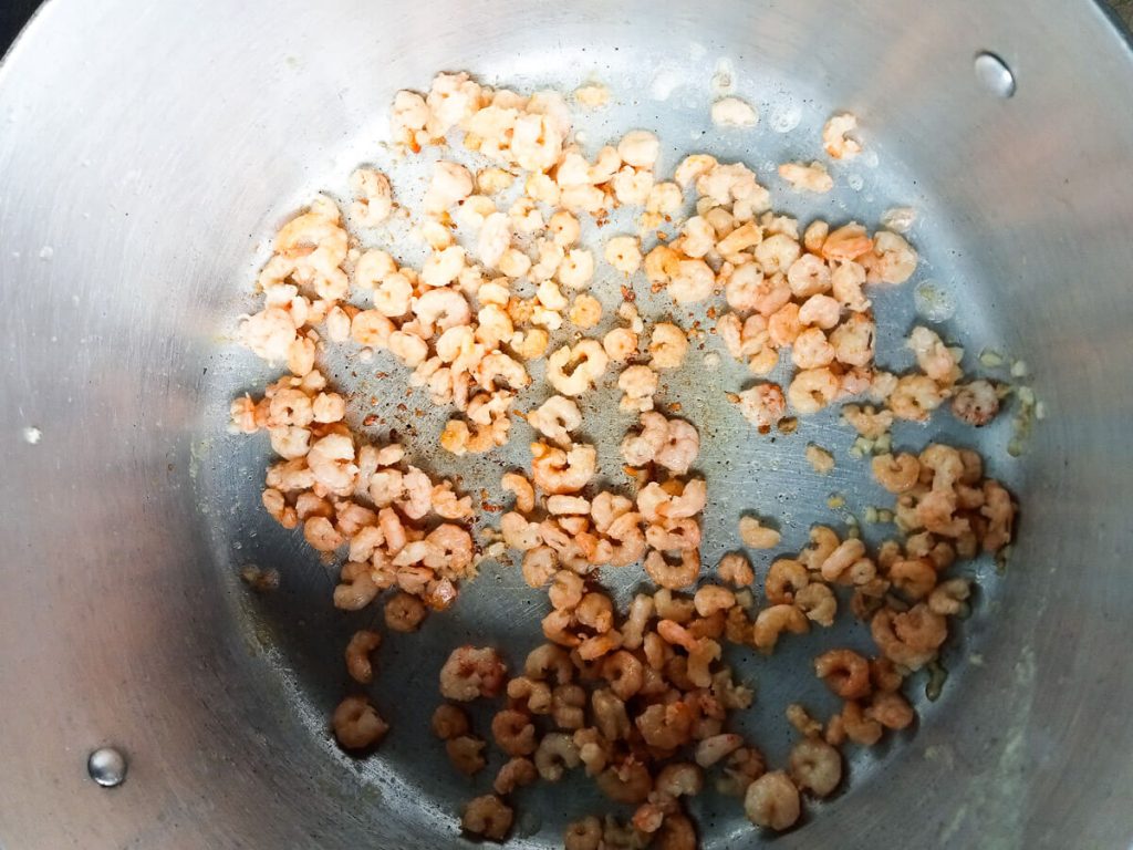 process photo of cooking shrimp for opo squash soup