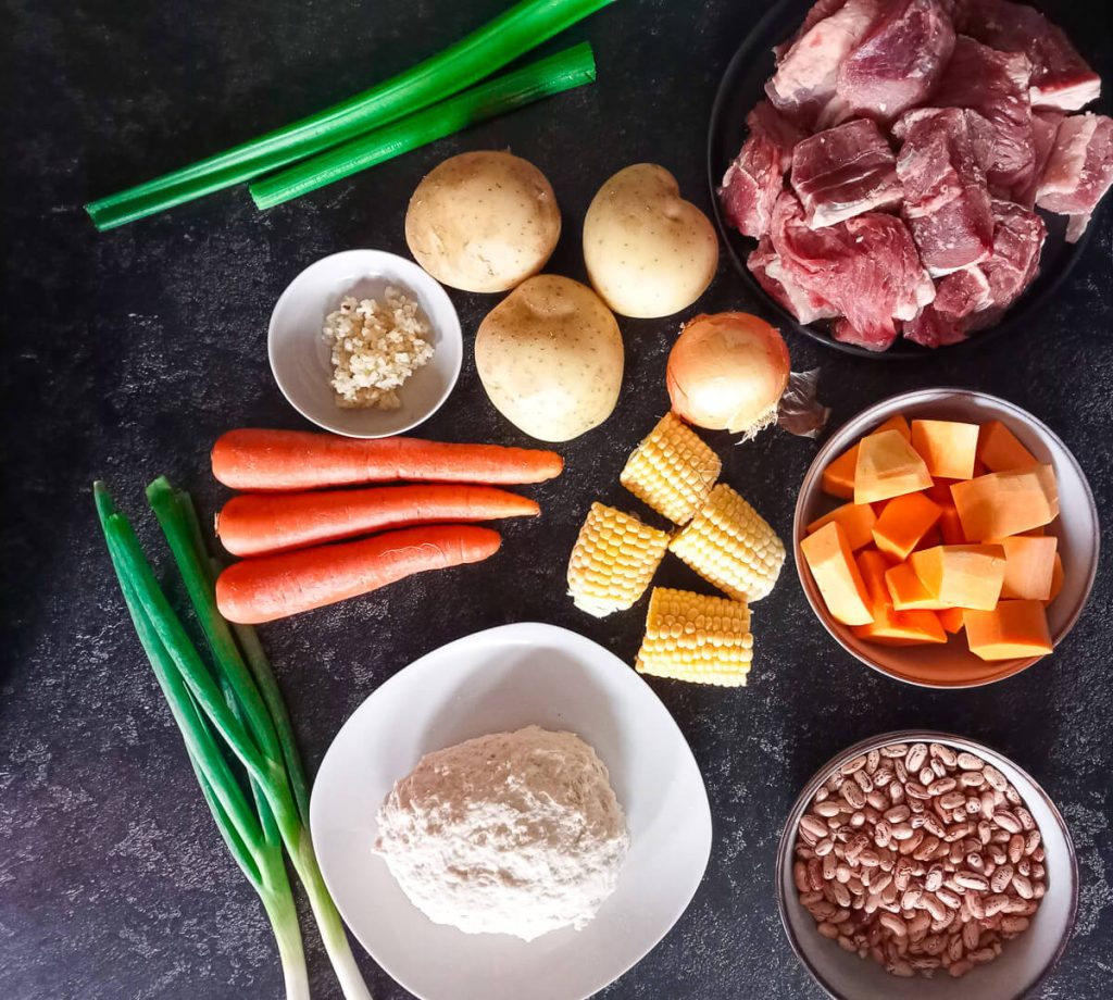 Ingredients: beef, butternut squash, carrot, red kidney beans, celery, spring onion, dumpling dough, sweet corn, potatoes, onion, and garlic.