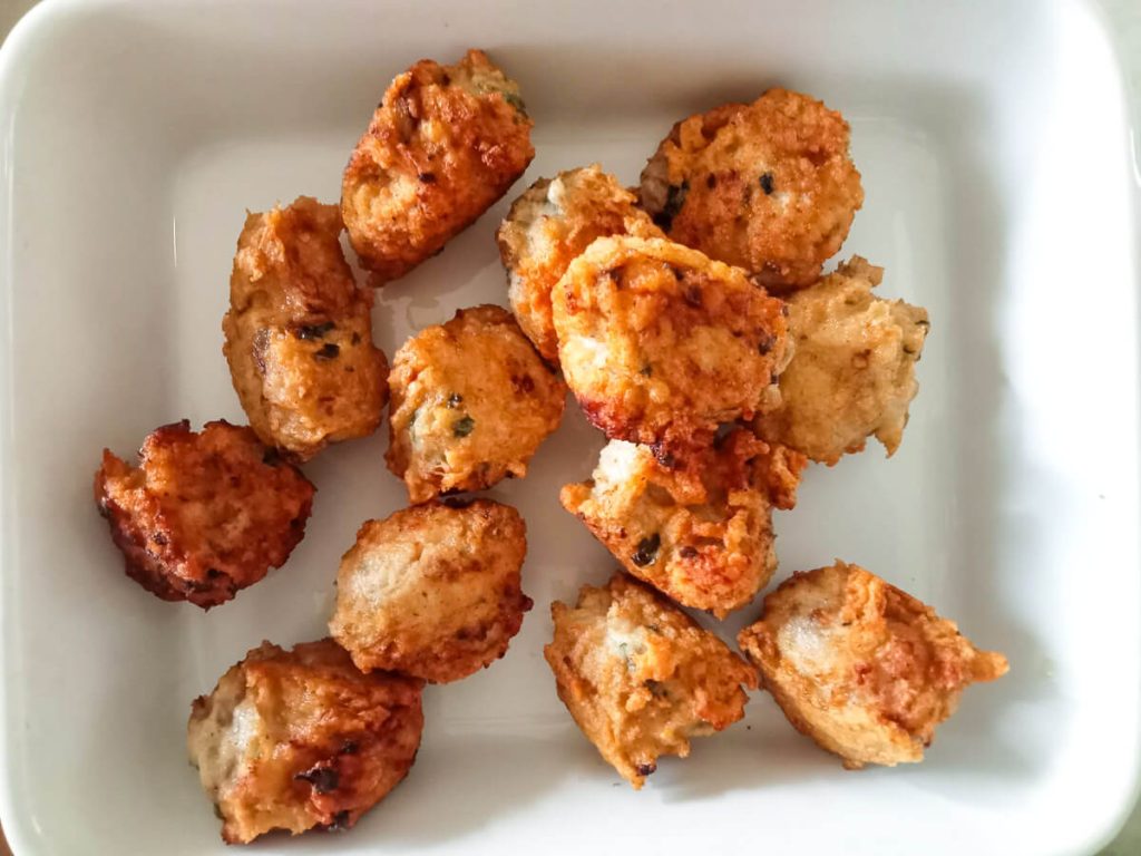 Chicken meatballs in a white baking dish