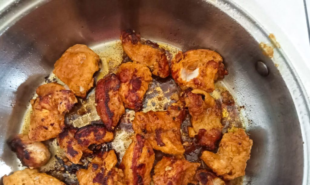 process image: searing the chicken on both side until golden brown